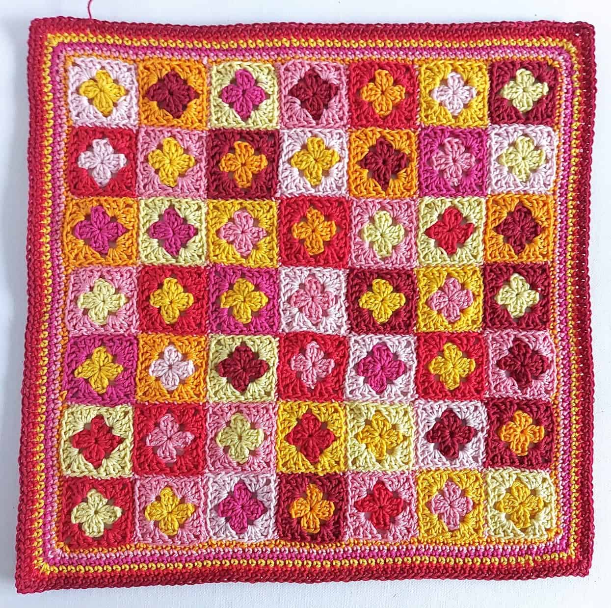 completed panel for the mini granny square pillow pattern