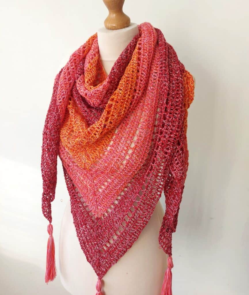crochet triangle shawl in orange and red