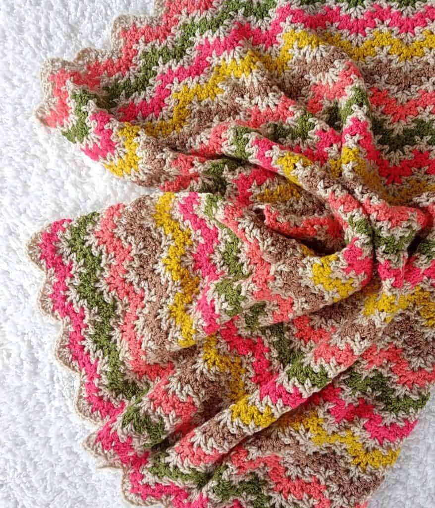 crochet ripple baby blanket in pink and green stripes
