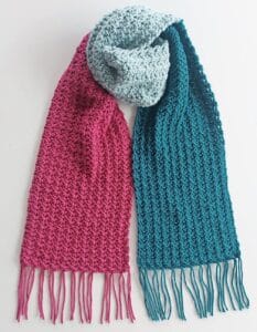 chunky scarf with a fringe on a white background