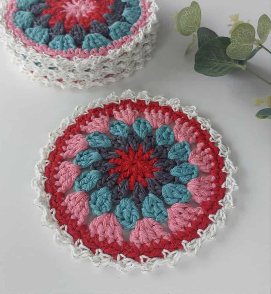pink red and white crochet coasters