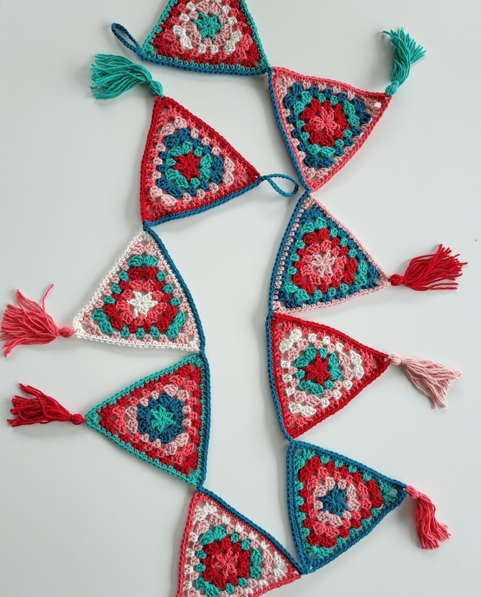 christmas crochet bunting with tassels in holiday colors