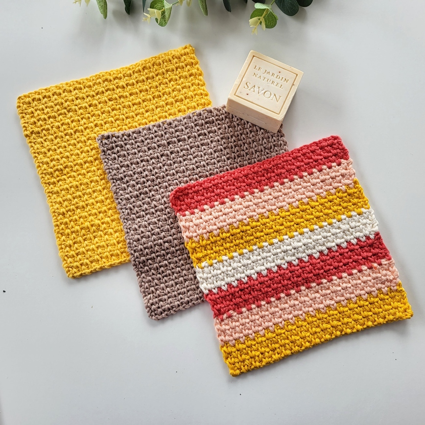crochet washcloths in yellow and orange