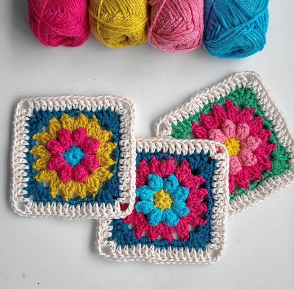 crochet flower squares and yarn