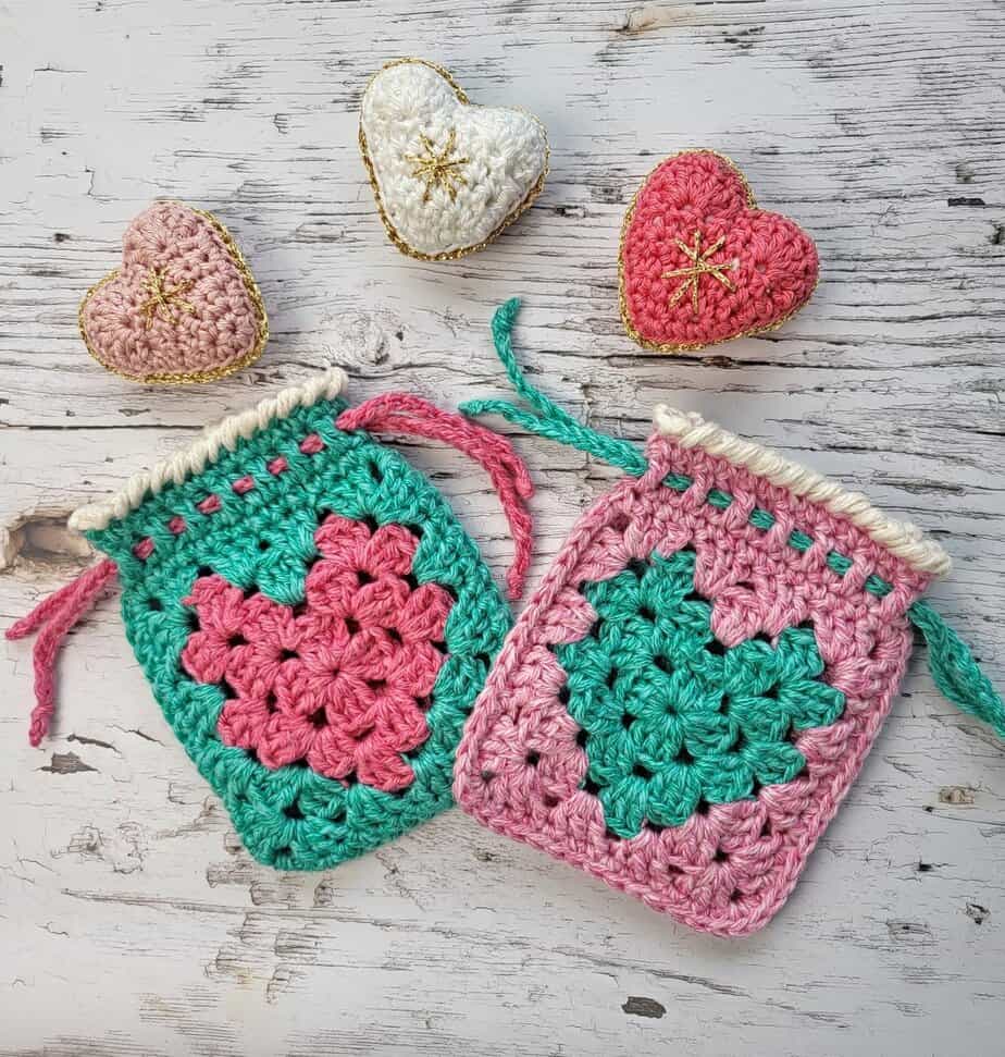 2 crochet granny heart pouchs in pink and green