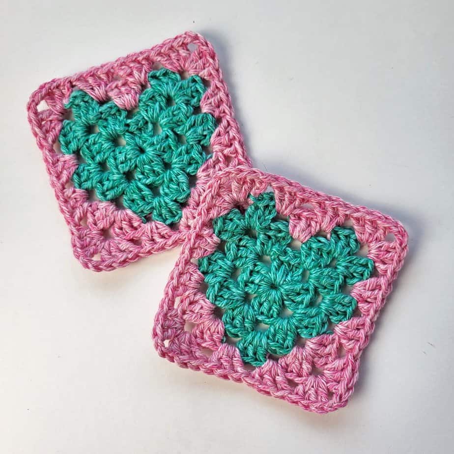2 crochet heart granny squares in pink and green