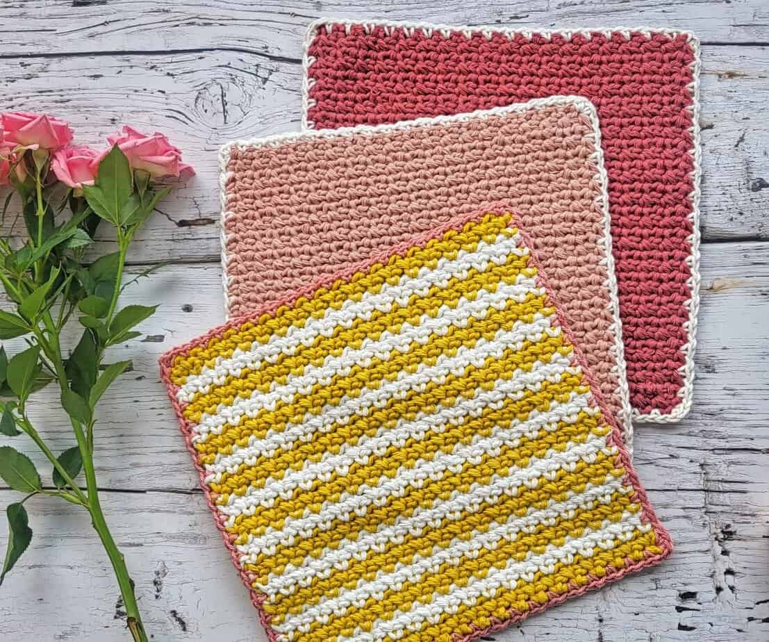 3 crochet dishcloths and some flowers