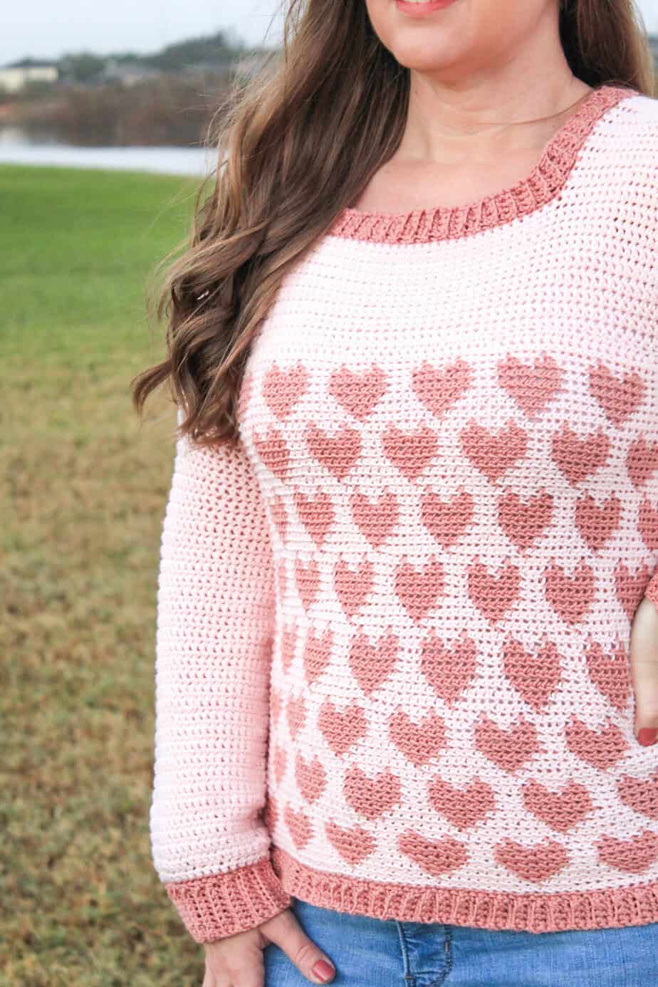 crochet sweater with pink hearts